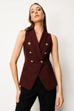 Double-breasted vest with flap pockets, Ekol style.