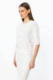 Button-front, short-sleeved knitted blouse.