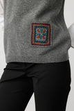Women's Crew Neck Wool Sweater with Colorful Crocheted Pocket and Collar Design