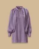 Loose-fitting, flowing tunic with wide sleeves.