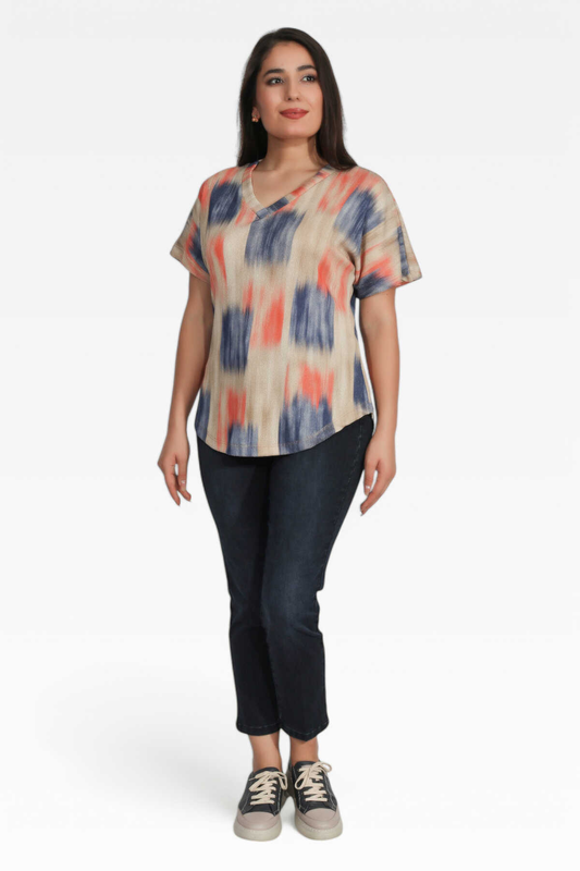 V-neck, dropped sleeve, relaxed fit, patterned knit sweater.