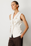 Double-breasted vest with flap pockets, Ekol style.