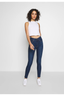 Levi's Yüksek Bel Dar Paça Minimalist Kadın Jean - Günlük Stil